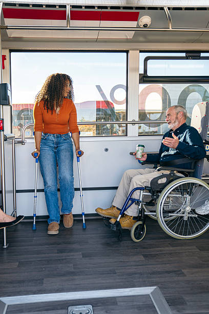 istock Diverse people with disabilities commuting on a public bus 2245137801