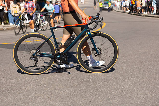 A cyclist crossing the street before a race