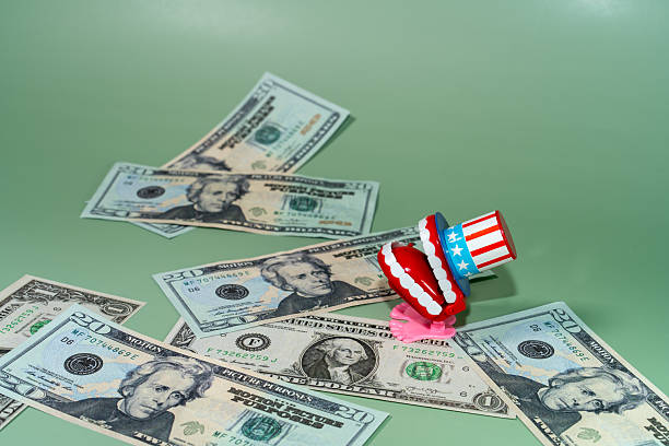 istock Patriotic Toy and American Dollars 2245141390