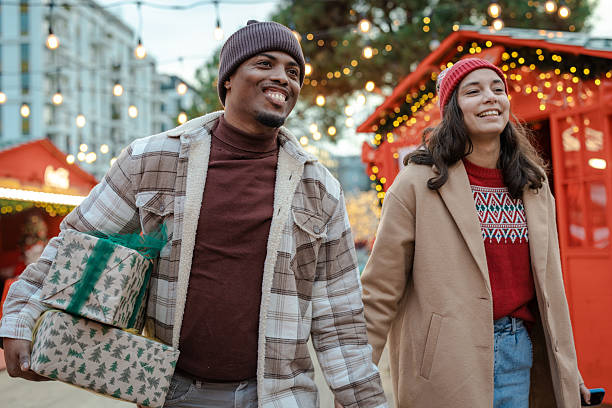 istock Couple on the Christmas parket 2245142175