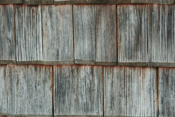 Background of a house with cedar shingles.