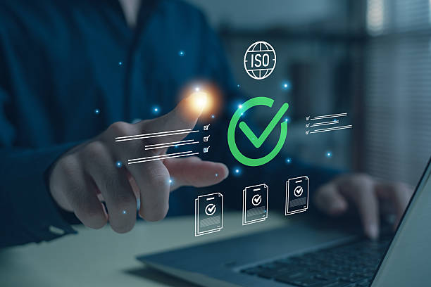 istock businessman touching a virtual screen with ISO certification and check mark icons, representing quality assurance, standard compliance, and business management in a digital corporate workspace. 2245154463