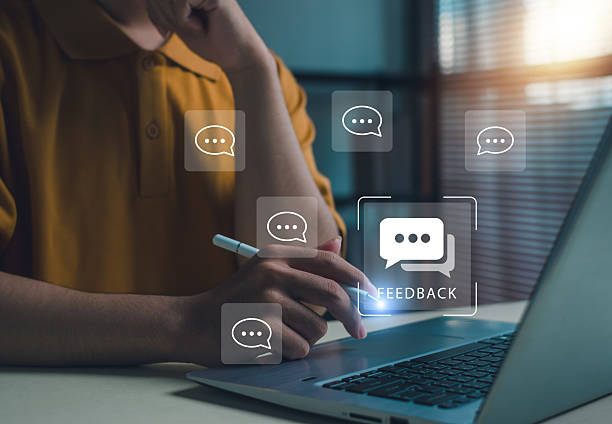 istock Digital feedback concept showing person using laptop with chat icons, representing online communication, customer review, user engagement, business interaction in modern technology workspace. 2245154509
