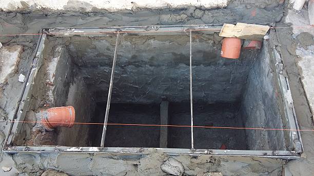 istock construction of a septic chamber on a construction site 2245156451