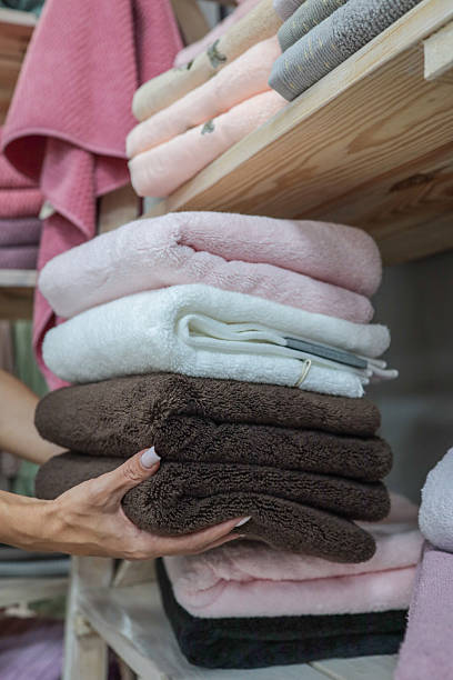 istock Stack of fluffy towels in various colors 2245158741