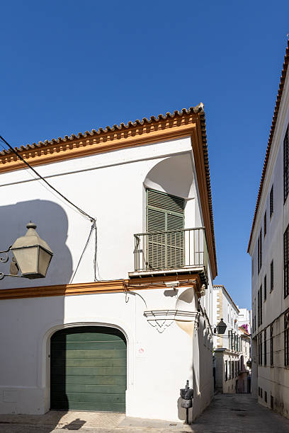 A magnificent building in a Mediterranean old town on the Atlantic coast. Unique architecture of the building facades in the city of Jerez de la Frontera, province of Cdiz, Andalusia, Spain.