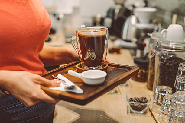 Barista is working in a coffee shop