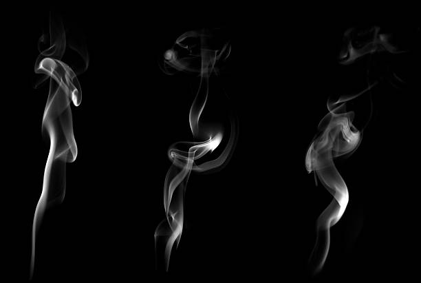 istock Abstract white smoke rising on black background with elegant flowing shapes and soft light. Perfect for artistic design, mystery themes, spiritual concepts, or modern minimalist digital backgrounds. 2245164852