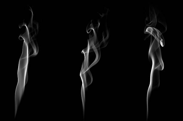 istock Abstract white smoke on black background with elegant vertical flow, symbolizing mystery, calmness, and spirituality. Ideal for artistic design, minimal backgrounds, meditation visuals, or creative 2245164882