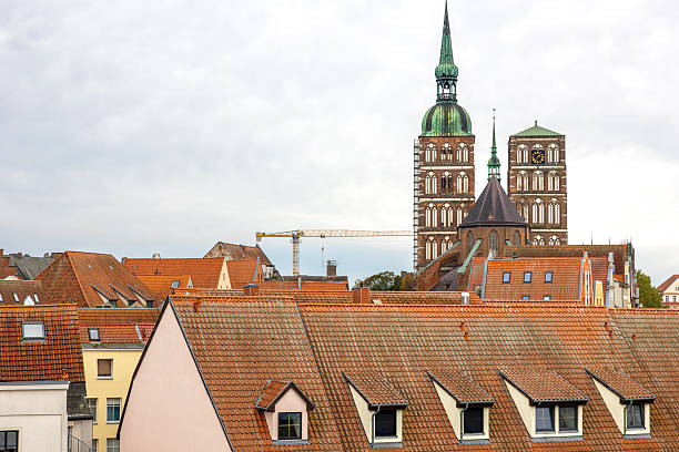 istock Brick Gothic above tiled roofs. European old town. 2245167688