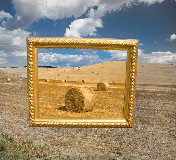 istock Tuscany, Siena,  rolls of hay, golden frame 2245169033