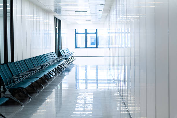 istock Blue chairs in the hospital hallway 2245174357