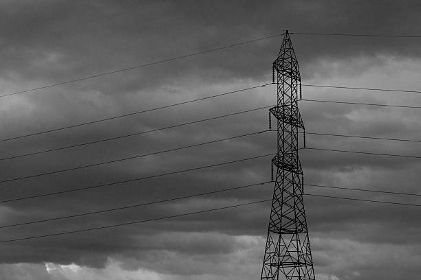 Storm clouds and high-voltage towers
