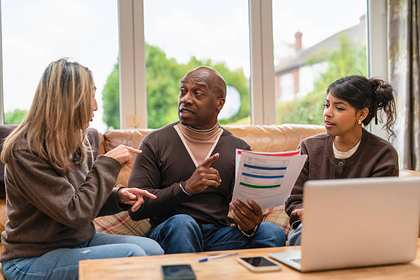 istock Group discussion on project plans at home during an afternoon gathering with active participation 2245184277