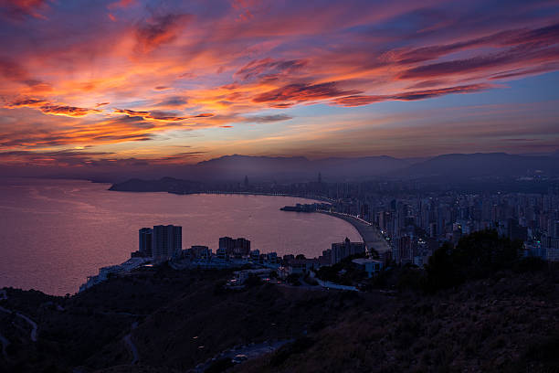 istock Benidorm cityscape and bay receiving a vibrant sunset 2245184320