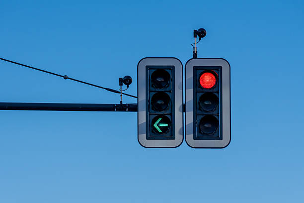 Red traffic light at night - turning back.