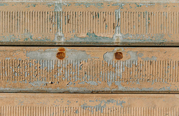 istock Rusty textured metal surface with peeling paint and corrosion 2245188174