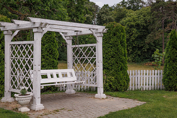 Beautiful alcove, wooden arbor, pavilion, bower, summer house, garden house.