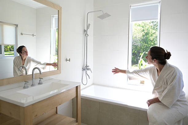 Modern bathroom with vanity cabinet and bathtub