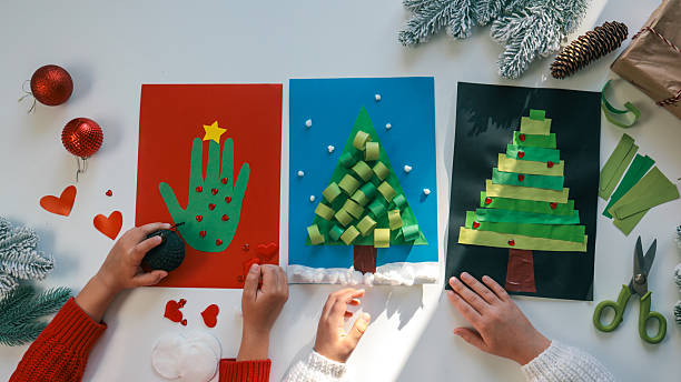 istock Children's craft Christmas idea, children doing creative work 2245192296