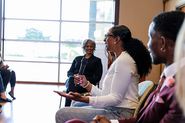 istock Engaged women sharing ideas and communicating during a professional gathering indoors. 2245193675