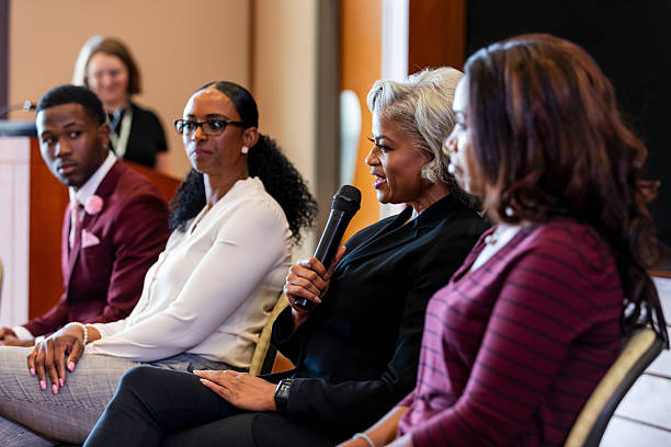 istock Diverse group engages in a professional discussion, sharing insights and ideas. 2245193697