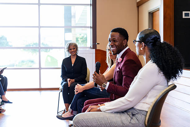 istock Diverse group of professionals engaged in discussion and learning indoors 2245193711