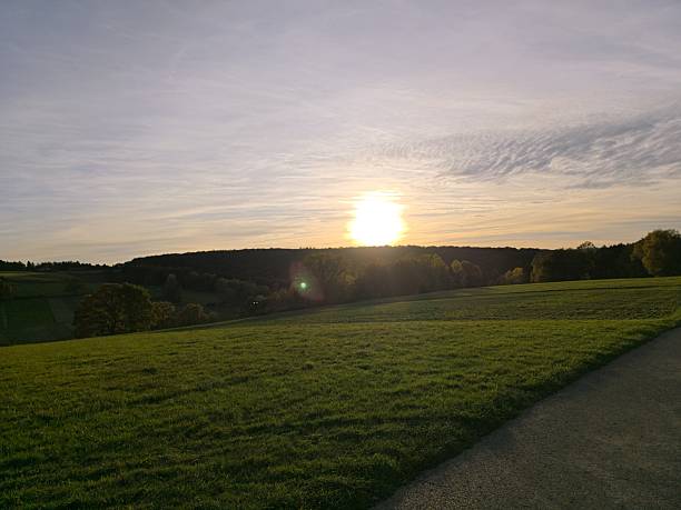 istock lanscape in the hills in germany, beautiful sunset skies 2245194319
