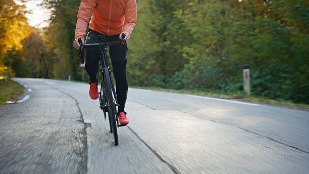 istock Young Male Caucasian Cyclist Riding Through Lush Forested Path 2245198338