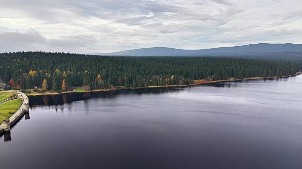 istock Reservoir shoreline and dam, infrastructure inspection flight 2245198633