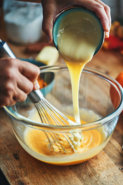 istock Preparing Pumpkin Pie for the Holidays in Domestic Kitchen 2245204318