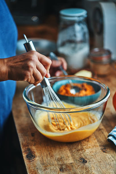 istock Preparing Pumpkin Pie for the Holidays in Domestic Kitchen 2245204320