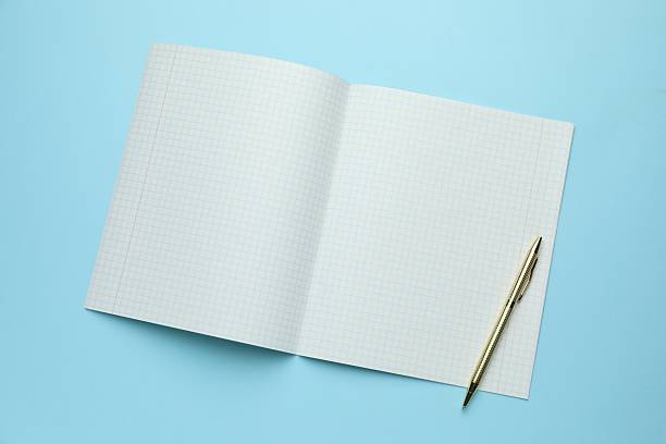 istock Open copybook and pen on light blue background, top view 2245205742
