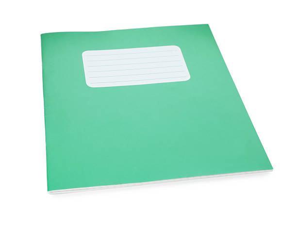 istock One green copybook isolated on white. School stationery 2245205846
