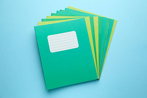 istock Colorful copybooks on light blue background, top view 2245205891
