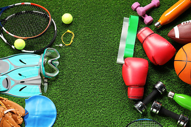 istock Different sports equipment on artificial grass, flat lay. Space for text 2245205968