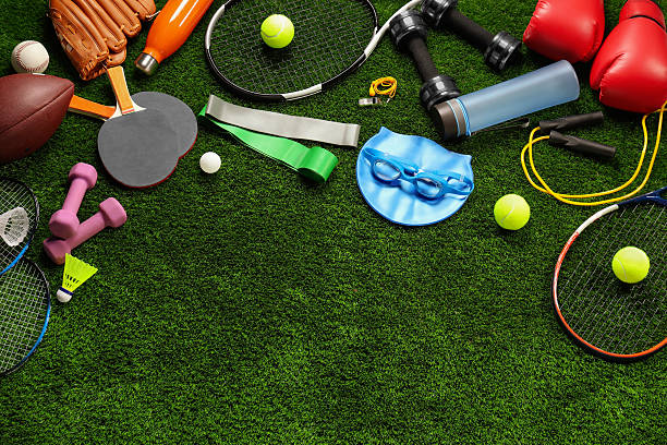 istock Different sports equipment on artificial grass, flat lay. Space for text 2245205984