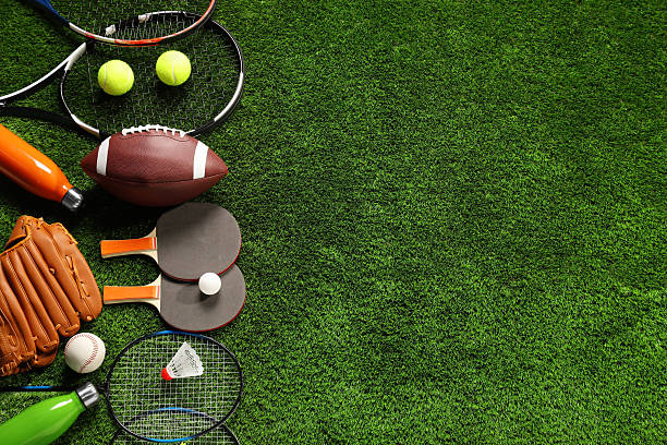 istock Different sports equipment on artificial grass, flat lay. Space for text 2245205987