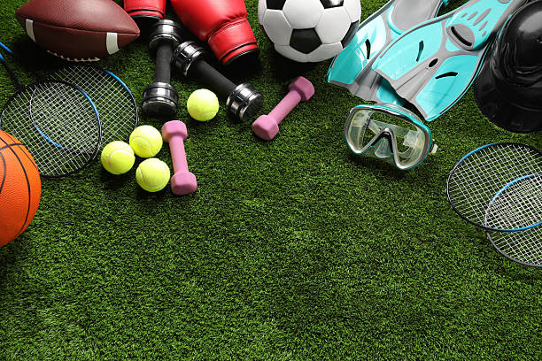 istock Different sports equipment on artificial grass, flat lay. Space for text 2245206007