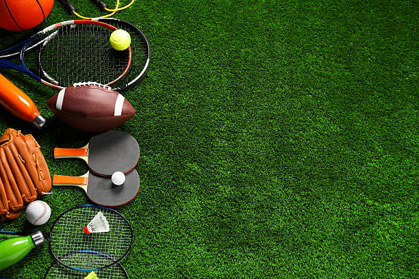 istock Different sports equipment on artificial grass, flat lay. Space for text 2245206024