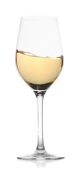 istock Tasty wine splashing in glass on white background 2245207745