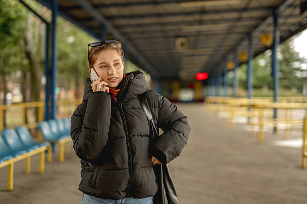 istock Girl Talking On Phone In Spring 2245207943