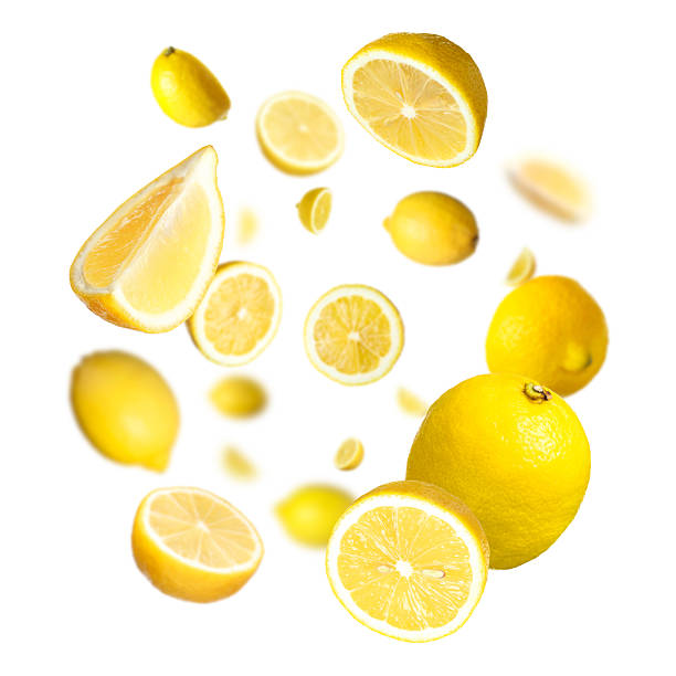 istock Fresh ripe lemons swirling in air against white background 2245208086