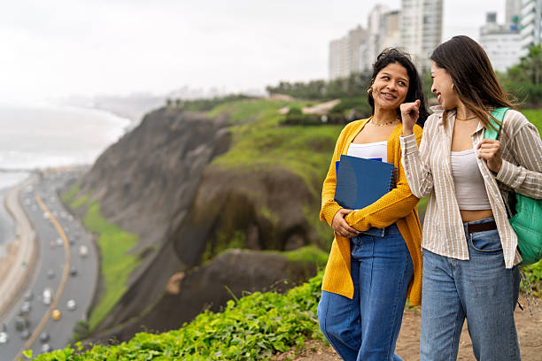 istock College students friends walking and talking after class in lima 2245208425