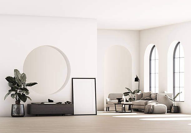 istock Minimal contemporary living room with cozy sofa, decor objects and sunlight through tall arched windows in a neutral bright space. 3d rendering. 2245209638