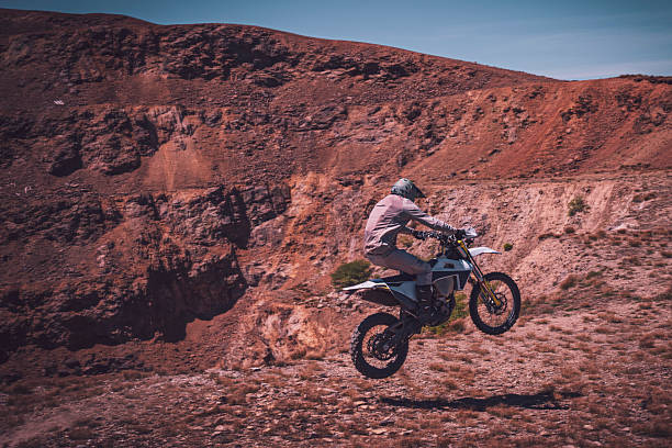 istock A motocross rider's adventure on a sunlit trail 2245214298