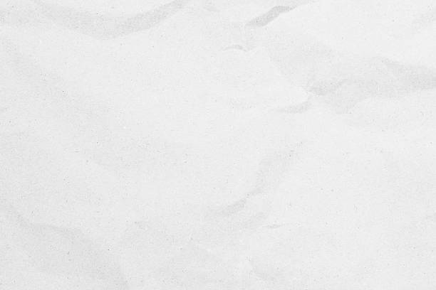 istock White recycled craft paper texture as background with copy space for text. 2245219610