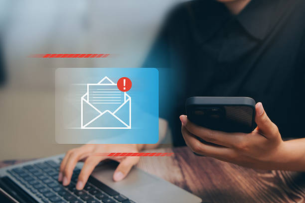 istock Email communication concept. Business person using smartphone and laptop with digital new message notification, representing online correspondence and business connection. 2245220372