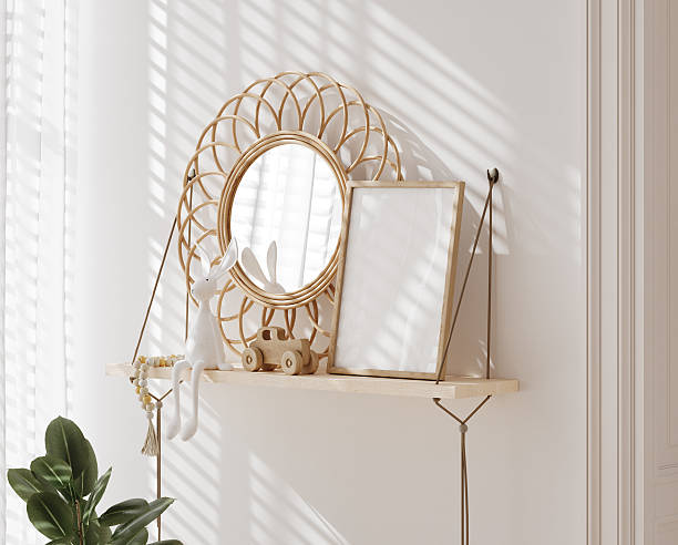 istock Poster frame mockup close up in Scandi-Boho nursery, shelf with toys, frame and rattan mirror, children room interior 2245224363