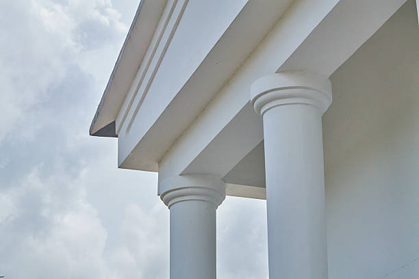 istock White neoclassical architectural columns, resort building, sunny sky, luxurious structure, outdoor contemporary design 2245225506
